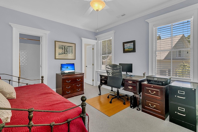 bedroom with crown molding, carpet, and multiple windows