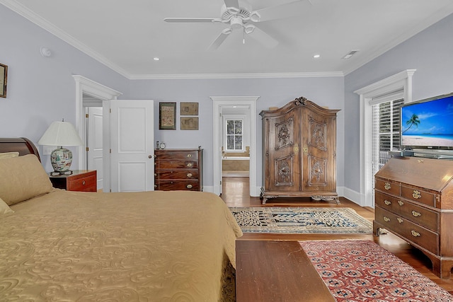 bedroom featuring crown molding, dark wood-type flooring, multiple windows, and ceiling fan