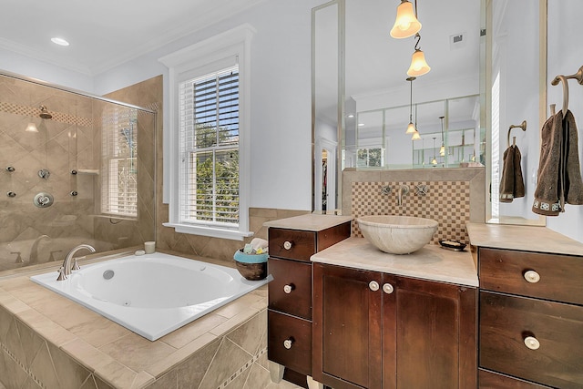 bathroom with crown molding, independent shower and bath, and vanity