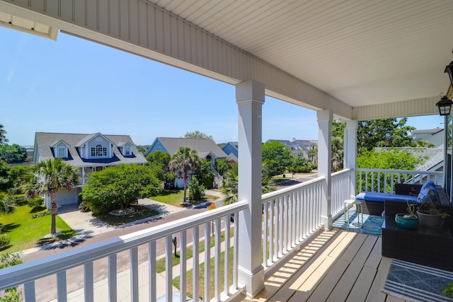 balcony featuring a residential view