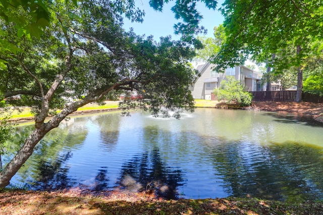 water view featuring fence