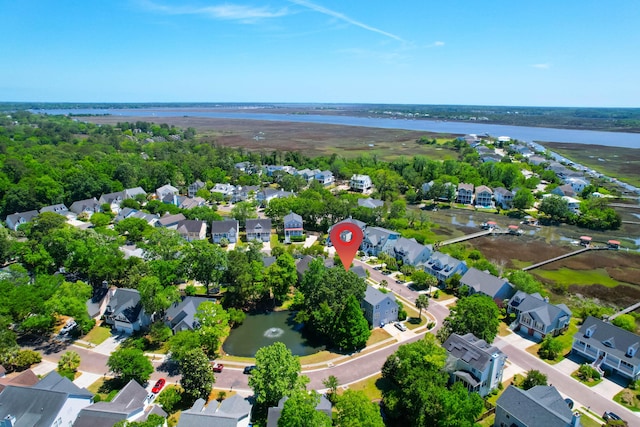 aerial view with a water view and a residential view