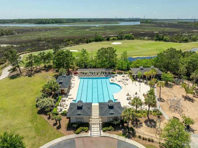 drone / aerial view featuring a water view and golf course view