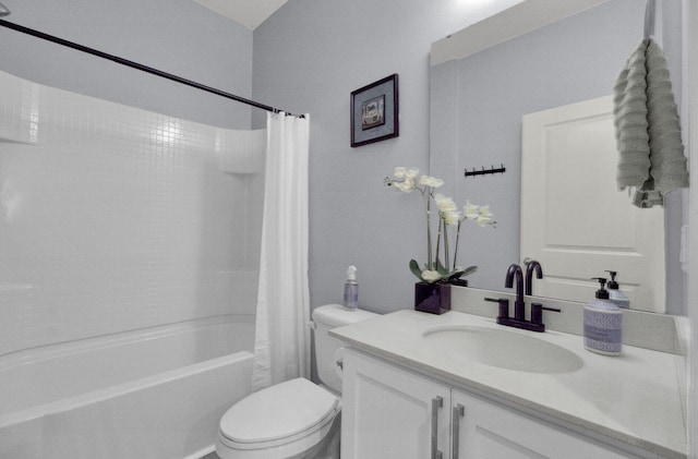 bathroom with shower / bath combo with shower curtain, vanity, and toilet