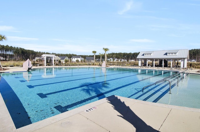 community pool featuring a patio