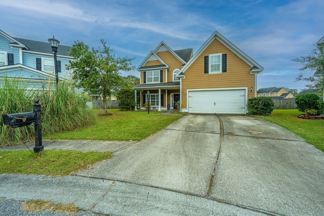 view of front of house with a front lawn and a garage