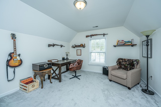 office space with light carpet and lofted ceiling