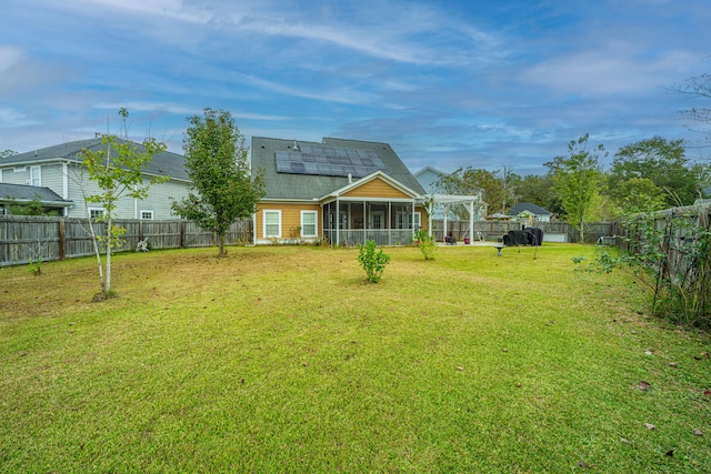 view of yard with a sunroom