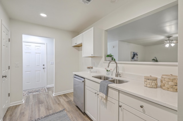 kitchen with white cabinets, ceiling fan, dishwasher, light hardwood / wood-style floors, and sink