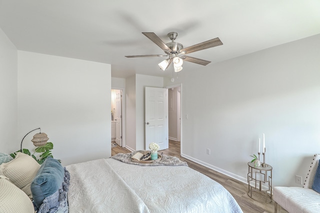 202 Greenmeadow Dr, Goose Creek, SC 29445 - bedroom featuring baseboards, ensuite bathroom, wood finished floors, and ceiling fan