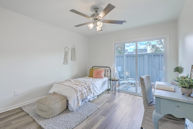 202 Greenmeadow Dr, Goose Creek, SC 29445 - bedroom featuring light wood-type flooring, baseboards, access to outside, and ceiling fan
