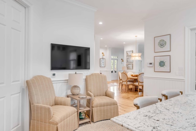 bedroom featuring wood-type flooring and crown molding