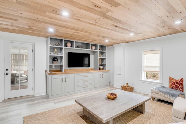 living room with wood ceiling, ornamental molding, and light hardwood / wood-style flooring