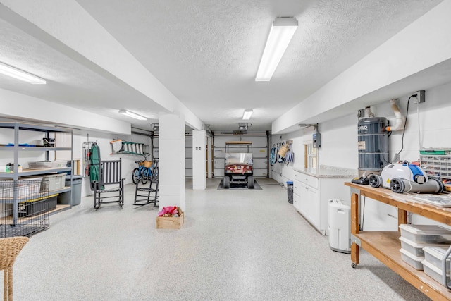 basement featuring a textured ceiling