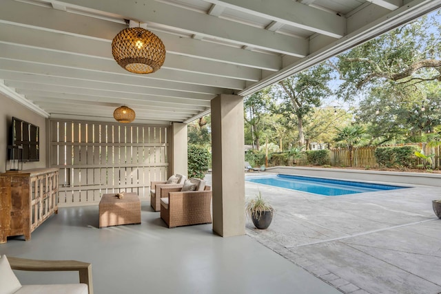 view of swimming pool with a patio