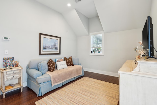 interior space featuring dark hardwood / wood-style flooring and vaulted ceiling