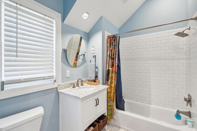 full bathroom with lofted ceiling, vanity, toilet, and shower / tub combo with curtain