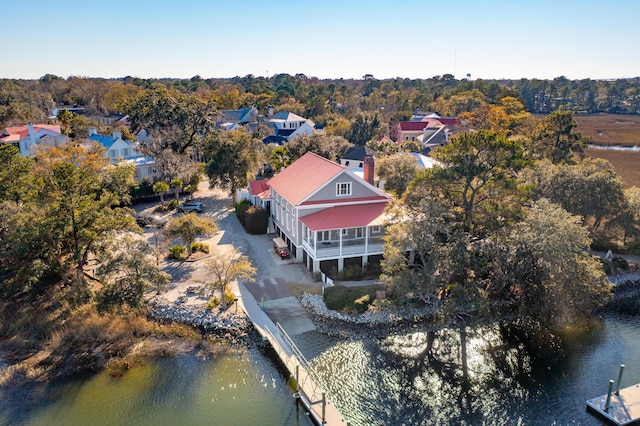 drone / aerial view with a water view