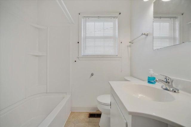 2830 Wire Rd, Saint George, SC 29477 - full bathroom featuring tile patterned flooring, vanity, a wealth of natural light, and toilet