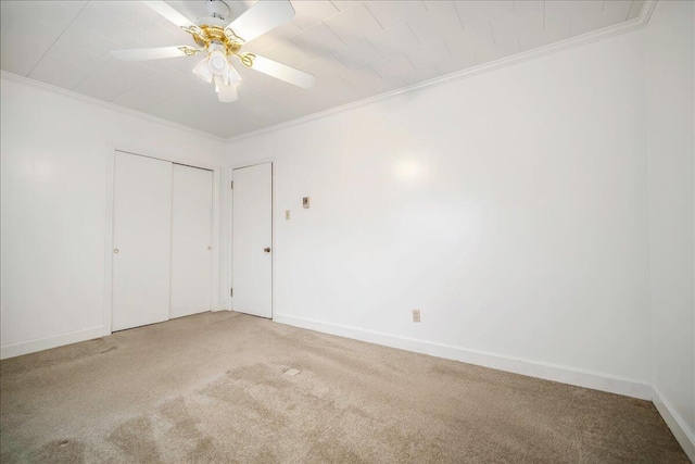 2830 Wire Rd, Saint George, SC 29477 - unfurnished bedroom featuring ceiling fan, ornamental molding, carpet floors, and a closet