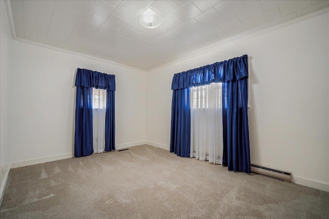 2830 Wire Rd, Saint George, SC 29477 - carpeted empty room with a baseboard heating unit and crown molding