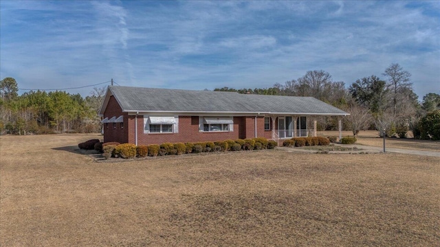 2830 Wire Rd, Saint George, SC 29477 - view of front facade featuring a front lawn and covered porch