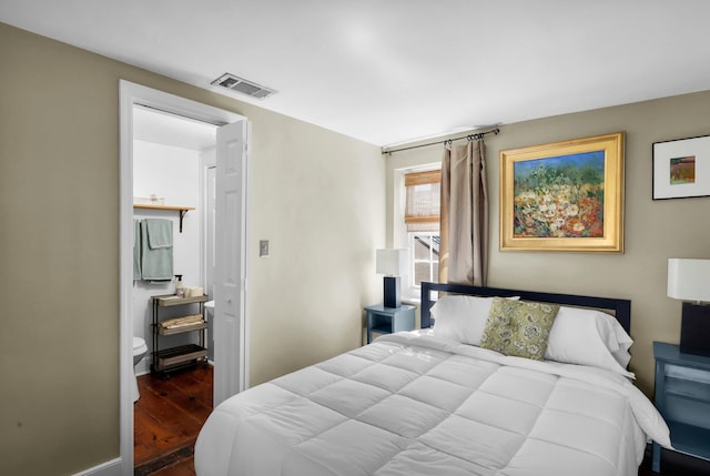 bedroom featuring hardwood / wood-style floors