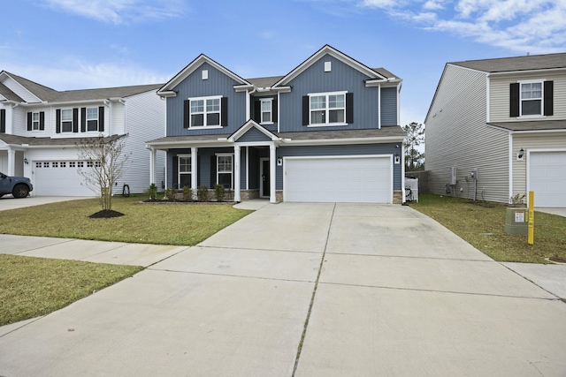 view of front of home with a garage, covered porch, and a front lawn