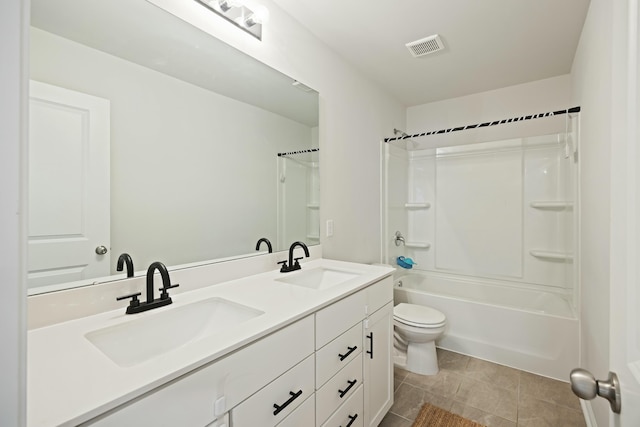 full bathroom featuring shower / tub combination, vanity, and toilet