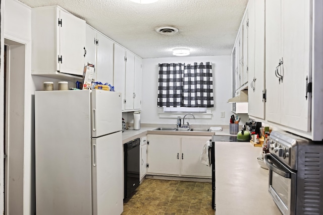 kitchen with white cabinetry, dishwasher, white fridge, and sink