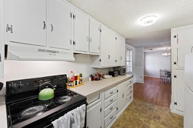 kitchen featuring a textured ceiling, a notable chandelier, white cabinets, dark hardwood / wood-style floors, and black electric range oven