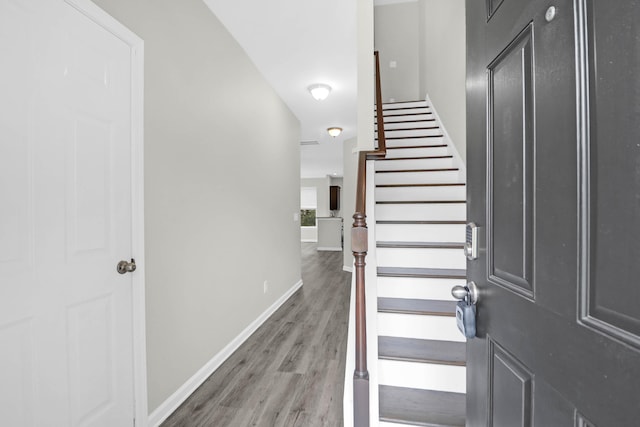 1510 Royal Colony Rd, Johns Island, SC 29455 - staircase featuring baseboards and wood finished floors