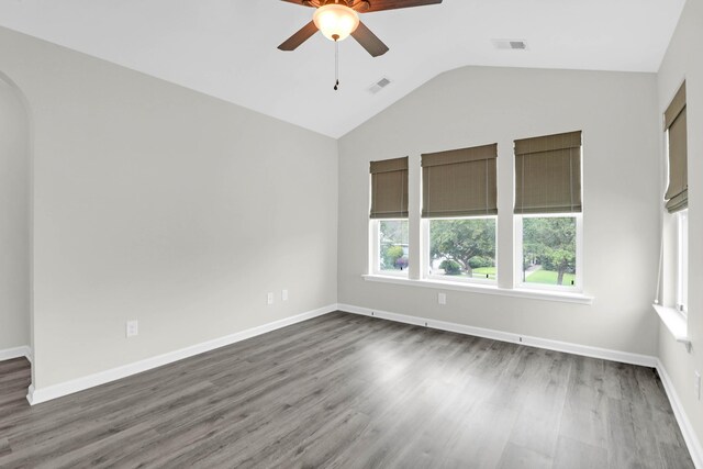 1510 Royal Colony Rd, Johns Island, SC 29455 - unfurnished room with a ceiling fan, vaulted ceiling, wood finished floors, and baseboards