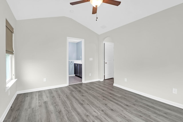 1510 Royal Colony Rd, Johns Island, SC 29455 - unfurnished room featuring ceiling fan, lofted ceiling, arched walkways, and wood finished floors