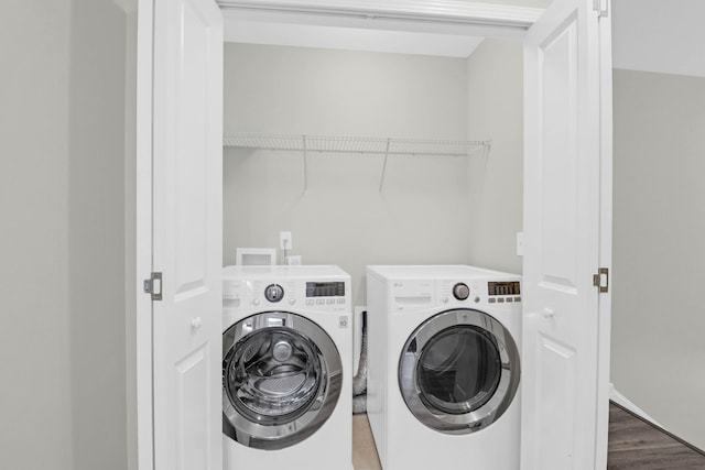 1510 Royal Colony Rd, Johns Island, SC 29455 - laundry room featuring washing machine and clothes dryer and wood finished floors