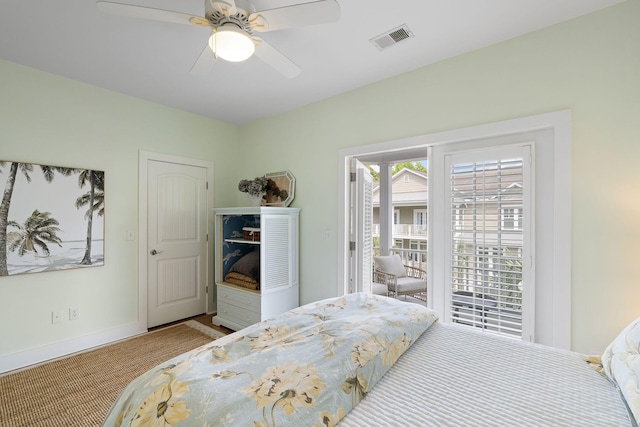 bedroom with visible vents, baseboards, ceiling fan, and access to outside