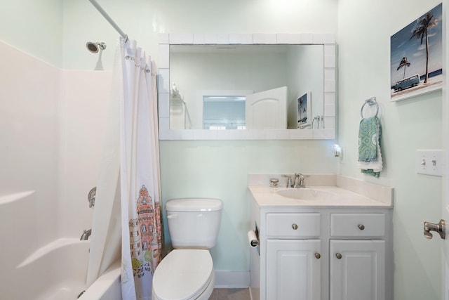 bathroom featuring vanity, shower / bath combination with curtain, and toilet