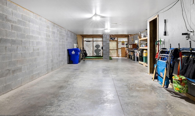 garage featuring concrete block wall