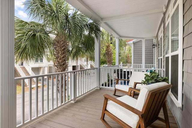 wooden deck featuring covered porch