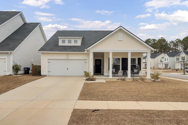 view of front facade featuring a garage and a porch