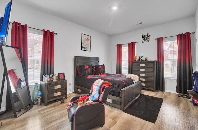 bedroom featuring light wood-type flooring