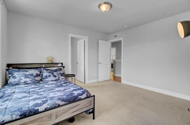 bedroom with light carpet