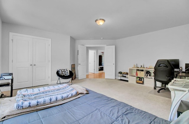 bedroom with a closet and carpet floors