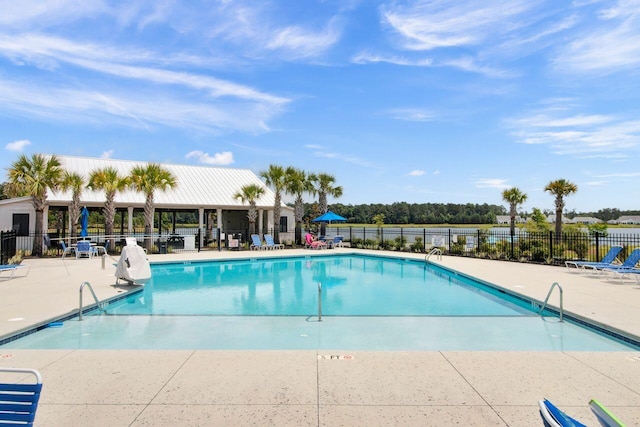 view of swimming pool with a patio area