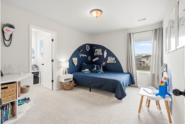 bedroom with carpet and visible vents