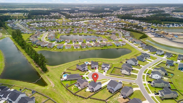 aerial view featuring a water view and a residential view