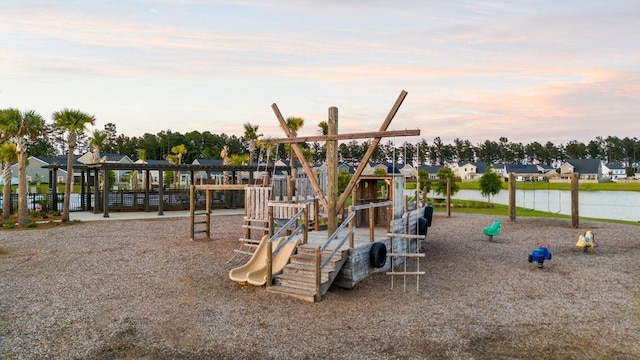 communal playground with a residential view and a water view