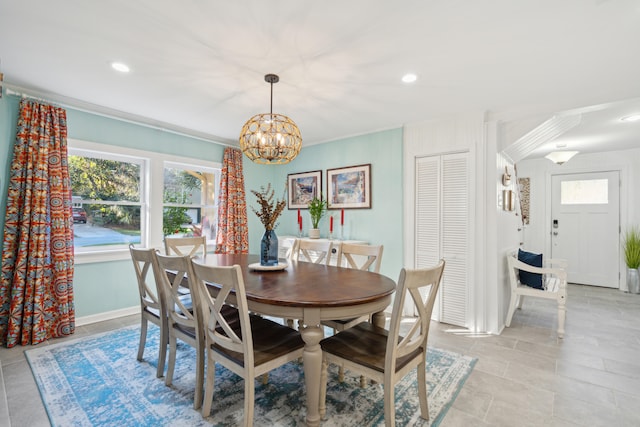 dining room featuring plenty of natural light and a chandelier