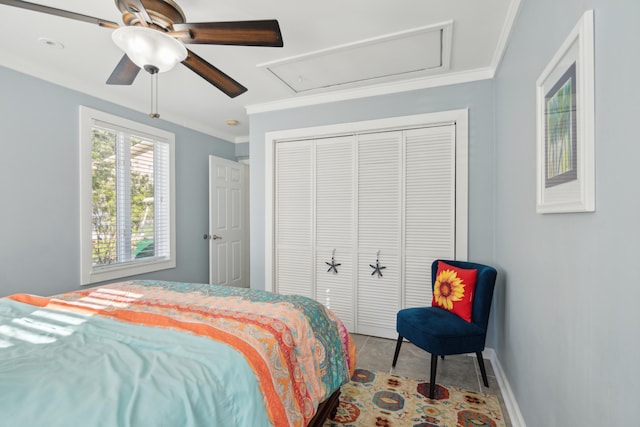 bedroom featuring a closet, ornamental molding, and ceiling fan