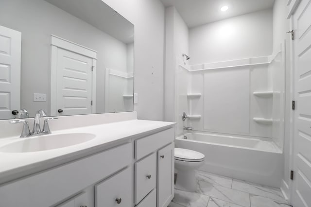 full bathroom with shower / tub combination, vanity, and toilet